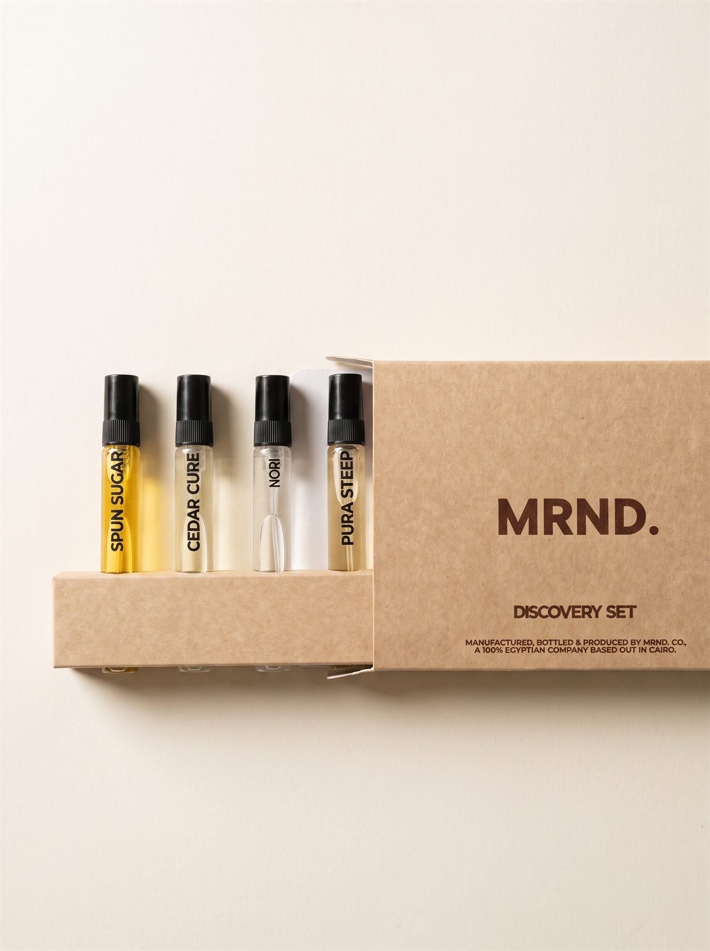 The MRND. Discovery Set — four 10ml vials beside its kraft box